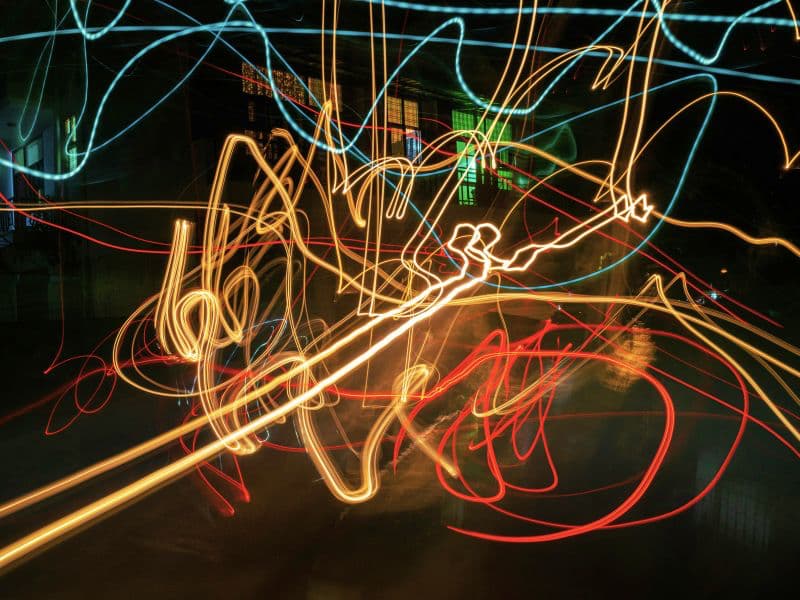 Lights travelling in many different directions representing how a child's mind works, where they are not able to properly assess their surroundings and childhood experiences.