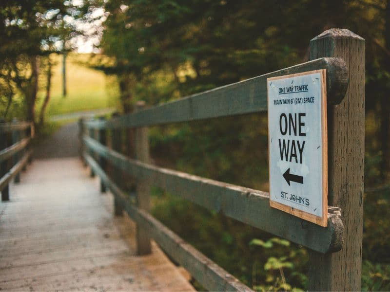 One way sign representing the expectation to follow a set path provided by elders in the South Asian community.